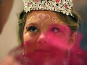 Gianna Pittao-Nagy, 6, celebrates her sixth birthday as she talks to the fairy god mother at The Princess Ball at the Fogolar Furlan, Saturday, Jan. 18, 2014. (DAX MELMER/The Windsor Star)