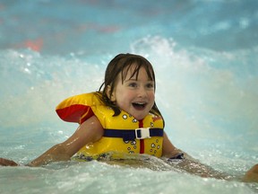Gabriella Crow, 4, has fun in the Wave Pool at the official opening of the Adventure Bay Family Water Park in downtown Windsor, Saturday, Jan. 18, 2014.   (DAX MELMER/The Windsor Star)