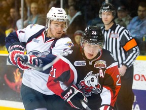 Windsor's Brady Vail, left, checks Niagara's Carter Verhaeghe Saturday in St. Catharines. (Courtesy of Julie Jocsak)