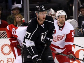 Kings forward Jeff Carter, centre, played in his 600th NHL game, against the Detroit Red Wings at Staples Center Saturday in Los Angeles. (Photo by Stephen Dunn/Getty Images)