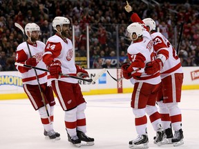Detroit's Tomas Tatar, second from right, celebrates his third-period goal with Jakub Kindl, from left, Todd Bertuzzi and Brian Lashoff against the Los Angeles Kings at Staples Center in Los Angeles. (Photo by Stephen Dunn/Getty Images)