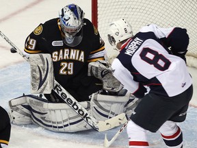 Windsor's Trevor Murphy, right, is stopped by Sarnia goalie Taylor Dupuis at the WFCU Centre. (TYLER BROWNBRIDGE/The Windsor Star)