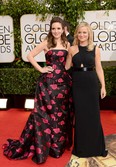 Actresses Tina Fey, left, and Amy Poehler attend the 71st Annual Golden Globe Awards held at The Beverly Hilton Hotel on January 12, 2014 in Beverly Hills, California.  (Photo by Jason Merritt/Getty Images)