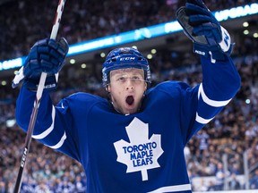 Toronto defenceman Morgan Rielly celebrates his goal against the Sabres Wednesday, (THE CANADIAN PRESS/Nathan Denette)