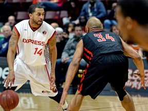 Express guard Dominique Buckley is guarded against the Brampton A's in Windsor's 118-106 win at the WFCU Centre. (JOEL BOYCE/The Windsor Star)