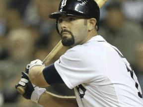 Detroit's Alex Avila hits a double to right field against the Indians. (Photo by Leon Halip/Getty Images)