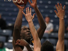 Windsor's Lien Phillip scores as the Windsor Lancers men's basketball host the Waterloo Warriors at the St. Denis Centre, Sunday, Jan. 26, 2014.   (DAX MELMER/The Windsor Star)