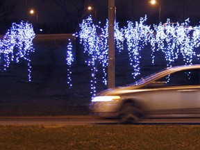 File photo of thousands of lights illuminating trees in the cloverleaf on E.C. Row at Dougall Avenue in Windsor, Ont. (Windsor Star files)