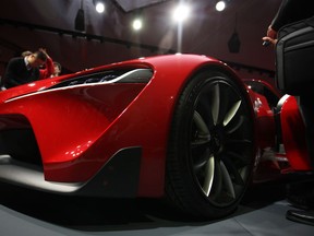 The Toyota FT1 is unveiled at the North American International Auto Show at Cobo Hall in Detroit, Monday, Jan. 13, 2014.  (DAX MELMER/The Windsor Star)