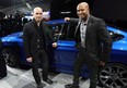 Chrysler designers Jeff Hammoud, left, and Ralph Gilles, both Canadians, made huge contributions to the new Chrysler 200, shown behind, during North American International Auto Show unveiling at Detroit's Cobo Center, Jan. 13, 2014. (NICK BRANCACCIO/The Windsor Star)