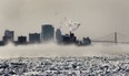 Downtown Windsor, Ont. appears to be in a deep freeze from this perspective from the city's east end looking over a frozen portion of the Detroit River on Monday, Jan. 6, 2014. (DAN JANISSE/The Windsor Star)