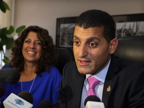 Mayor Eddie Francis and his wife, Michelle, left, during press conference at City Hall January 10, 2014. (NICK BRANCACCIO/The Windsor Star)