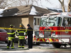 Windsor Fire and Rescue deal with a house fire at 8685 Darlington Cres., Sunday, Jan. 19, 2014.  (DAX MELMER/The Windsor Star)