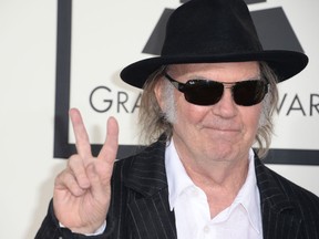 In this file photo, Neil Young arrives on the red carpet for the 56th Grammy Awards at the Staples Center in Los Angeles, California, January 26, 2014. (ROBYN BECK/AFP/Getty Images)