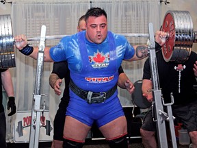 Windsor powerlifter Kelly Branton squatted 804 pounds for an all-new Canadian record during the Ontario Provincial Equipped Three Lift and Bench Press Championships at the Knights of Columbus Hall in Belle River, Ont. Saturday, Jan. 18, 2014. (JOEL BOYCE/The Windsor Star)