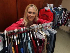 Law student Amy Johnson, a single mother with six children, has started Cuddles Clothing for Kids at St. Mark's Anglican Church in Windsor on Thursday, Jan. 2, 2014. The program provides free clothing for kids up to 18 years old.                       (TYLER BROWNBRIDGE/The Windsor Star)