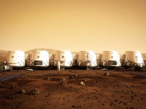 This handout photo shows an artist’s rendition of a settlement on Mars. More than 1,000 candidates — from 200,000 hopefuls — are being considered for a private Mars colonization mission to be partly funded by a reality-TV show. They are to be whittled down to just 24, who will be sent over six launches starting in 2024, according to Mars One, the Dutch-based non-profit group behind the audacious endeavour. (HO , AFP/Getty Images)