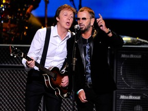 This April 4, 2009 file photo shows Paul McCartney, left, and Ringo Starr performing at the Change Begins Within Concert in New York. The Recording Academy announced Tuesday, Jan 14, 2014, that both McCartney and Starr will perform at the Jan. 26 Grammy awards show. The Beatles will be honored at the Academy’s Special Merits Awards a day before, and a day after the big show, the iconic group will be the centre of a performance special featuring Eurythmics and other acts playing Beatles hits. (AP Photo/Stephen Chernin, File)