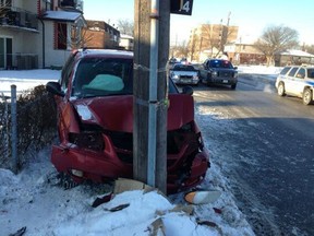 At least one person has been taken to hospital following a collision between a minivan and a pole on College Avenue near Josephine Avenue in Windsor. (TwitPic: Nick Brancaccio/The Windsor Star)