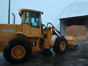 A front-end loader fills snow removal vehicles with salt at the City of Windsor Crawford Yard, Sunday, Jan. 5, 2014.  (DAX MELMER/The Windsor Star)