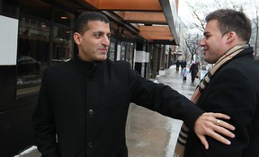 Mayor Eddie Francis, left, chats up with a supporter of his, Eric Kukucka, while on the street in downtown Windsor on the morning he announced he would not be running for a fourth term, Friday, Jan. 10, 2014. (DAX MELMER/The Windsor Star)