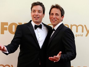 Seth Meyers, right, with Jimmy Fallon, is moving from his Weekend Update desk to his own late night show on NBC. (Chris Pizzello , AP)