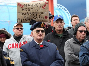 In this file photo, local veterans and their supporters gather at 467 University Ave. W. to protest the closure of the Veterans Affairs office on Jan. 31, 2014. (Nick Brancaccio / The Windsor Star)