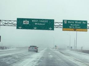 Poor weather conditions caused Highway 401 to close for several kilometres in both directions, Saturday, Jan. 25, 2014.  (DAX MELMER/The Windsor Star)