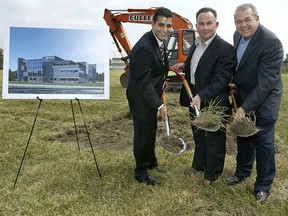 Files: Windsor mayor Eddie Francis, left, Marty Komsa, president and chief executive officer of Windsor Family Credit Union, and chair of the board Marty Gillis participate in the ground breaking ceremony for its new headquarters on Aug. 19, 2005. (Windsor Star files)