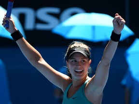 Canada's Eugenie Bouchard celebrates after beating Serbia's Ana Ivanovic in the quarter-finals of the Australian Open. (Getty Images)