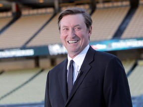 Wayne Gretzky was at Dodger Stadium to promote Saturday's outdoor game. (AP Photo/Nick Ut)