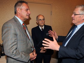 Files: Gary Switzer, left, and Martin Girash both with Erie St. Clair LHIN speak with MPP Ernie Hardeman, chair of Standing Committee on Social Policy, Local Health System Integration Act review at Holiday Inn and Suites January 30, 2014 - (NICK BRANCACCIO/The Windsor Star)