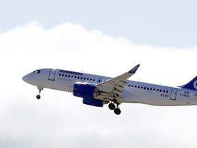 Bombardier told employees Tuesday that the cuts are required due to delays in the launch of new planes and tough market conditions. (Clement Sabourin/AFP/Getty Images)