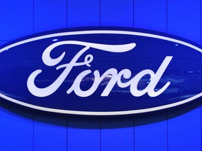 The Ford Motor Company logo at the North American International Auto Show January 14, 2014 in Detroit. (Stan Hondastan/AFP/Getty Images)