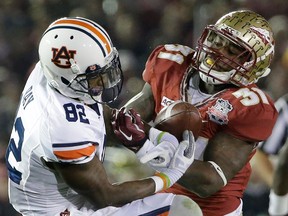 Florida State's Terrence Brooks, right, breaks up a pass intended for Auburn's Melvin Ray during the second half of the BCS National Championship college football game Monday in Pasadena, Calif. (AP Photo/David J. Phillip)