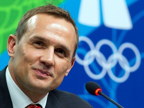 Steve Yzerman talks to reporters at the 2010 Vancouver Olympic Winter Games. (AP Photo/Ryan Remiorz, CP)
