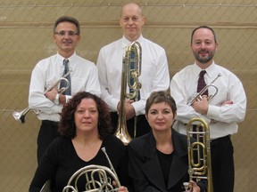 The Majestic Brass of players from the Windsor Symphony: Front row, Bernadette Berthelotte, left, and Corey Fitzpatrick, trombone. Back row, trumpet player Bob Fazecash, left, Mike Stone on trombone and trumpeter Brian Zanier.
