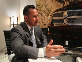 Reid Bigland, President and CEO of Chrysler Canada Inc. speaks at the North American International Auto Show in Detroit, MI. on Tues. Jan. 14, 2014.  (DAN JANISSE/The Windsor Star)