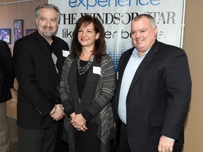 Dino De Simone, left, Mila Lucio and Gary Poole during the announcement of the nominees for the 24th Annual Business Excellence Awards at the Windsor Star News Cafe in Windsor on Wednesday, January 8, 2013. The three are representing Accucaps Industries Limited, A.P. Plasman Inc and HBPO Canada which are finalists in for the Large Company of the Year Award.                        (TYLER BROWNBRIDGE/The Windsor Star)