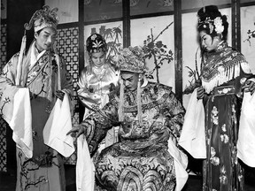 Members of Windsor's Chinese community rehearse for a Chinese opera on Jan. 25, 1968 that they will present Feb. 4 to celebrate the beginning of their new year. The event will start at 3:30 p.m. at the Chinese Benevolent Association headquarters, 231 Wyandotte St. E. From left, Keith Lee, Mrs. Po Anne Gan, Ken Gene and Diane Gene. (Star Staff Photo)