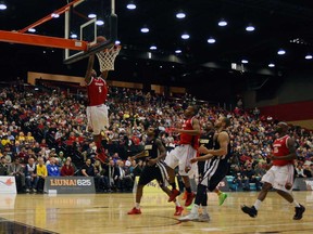 Windsor's Stefan Bonneau slams the basketball against the London Lightning during the Clash at the Colosseum at Caesars Windsor on Wednesday, January 15, 2013. (TYLER BROWNBRIDGE/The Windsor Star)