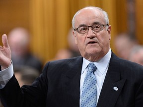 Veterans Affairs Minister Julian Fantino answers a question during question period in the House of Commons in Ottawa, Wednesday, January 29, 2014. THE CANADIAN PRESS/Sean Kilpatrick