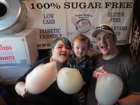 Richard Campbell and Katie Hillier-Campbell, co owners of Nana Ruth's Sugar Free Cotton Candy, show off their product with their son Calin, 2. (JASON KRYK/The Windsor Star)