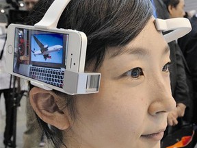A headset with a smartphone, called a Neurocam, is among the many new gadgets in the fastgrowing wearables industry, one which could exceed $30 billion in a few years.
(Getty Images Files)
