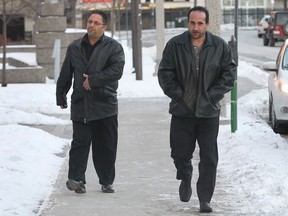Giorgio Loiacono, left, and John Derose leave the Superior Court in Windsor on Wed. Jan. 29, 2014.   (DAN JANISSE/The Windsor Star)