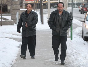 Giorgio Loiacono, left, and John Derose leave the Superior Court in Windsor on Wed. Jan. 29, 2014.   (DAN JANISSE/The Windsor Star)