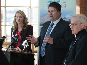 Windsor Regional Hospital Infection Control manager Erika Vitale,  CEO David Musyj,  and Medical Officer of Health Dr. Allan Heimann discuss this year's flu season. (JASON KRYK/The Windsor Star)