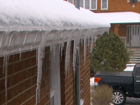 Icicles hang from the eaves of a home. (Postmedia News files)
