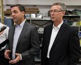 In this file photo, Tim Hudak, left, and Dave Brister at EPG Electric in Windsor on Friday, September 21, 2012.  (TYLER BROWNBRIDGE / The Windsor Star)