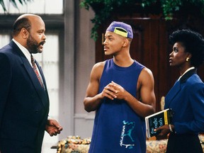 This photo provided by NBC shows, from left, James Avery as Philip Banks, Will Smith as William "Will" Smith, and Janet Hubert as Vivian Banks, in episode 7, "Def Poet's Society" from the TV series, "The Fresh Prince of Bel-Air." Avery, 68, the bulky character actor who laid down the law as the Honorable Philip Banks has died. Avery's publicist, Cynthia Snyder, told The Associated Press that Avery died Tuesday, Dec. 31, 2013. (AP Photo/NBC, Ron Tom)
